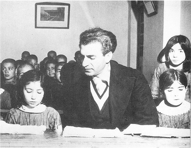 Shah Mohammad Reza Pahlavi visits a co-educational school, 1955